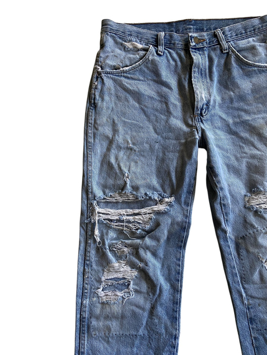 VTG Distressed Rustler Light Wash Jeans Sz 32x30