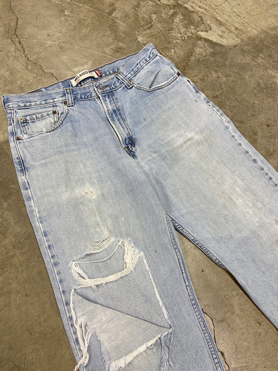 VTG Levis 550 Light Wash Ripped Jeans Sz 34x31